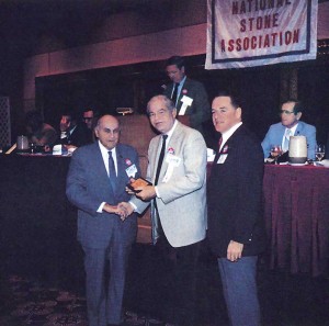 Bob Bartlett, far right, presents an award during a National Stone Association convention in the 1980s.