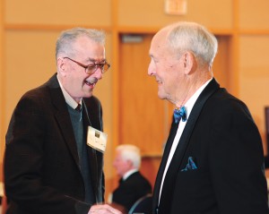 Paul Detwiler Jr., left, visits with Bernie Grove during a past Hall of Fame induction ceremony.